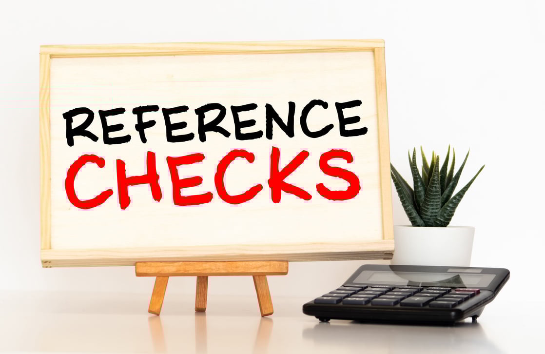 Business concept about Reference Checks with phrase on the sheet.